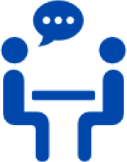 Two figures talking at a table icon.