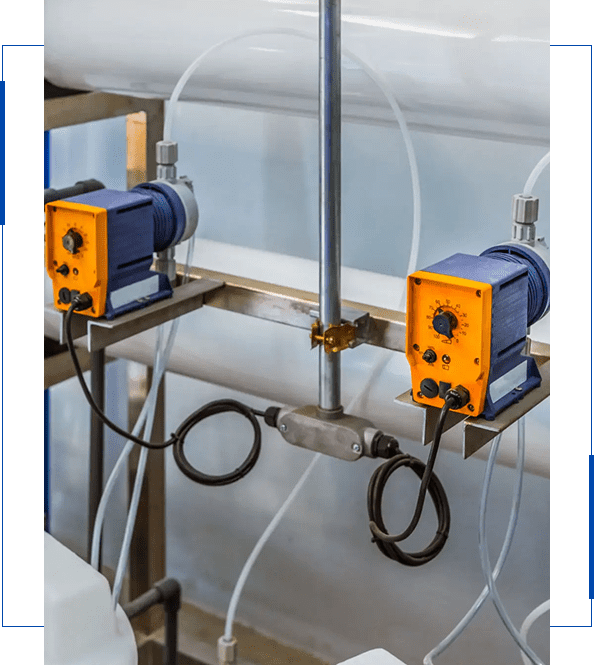 Two flow meters with digital displays in an industrial setup.